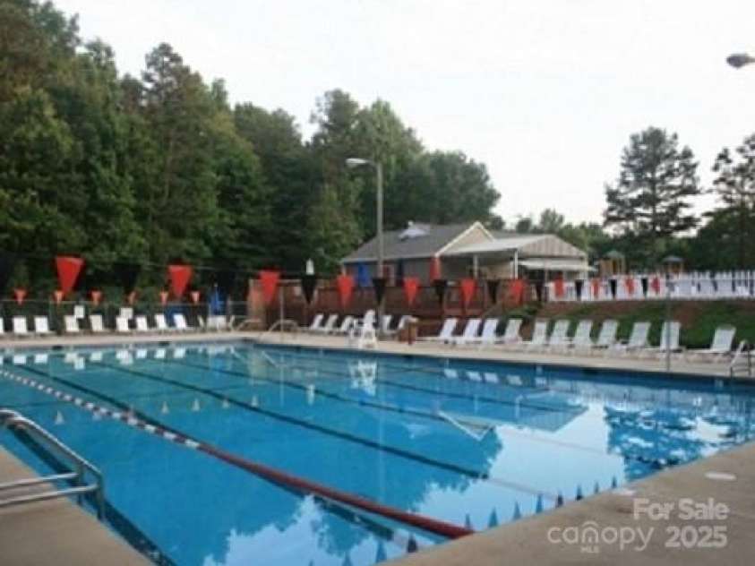 2359 Fernridge Lane, Matthews, NC 28105.  MLS# CAR4296338, YatesRealty ID 35175. Pool in neighborhood