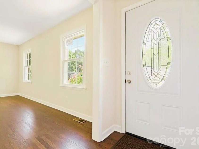6315 Spring Garden Lane, Charlotte, NC 28213.  MLS# CAR4399820, YatesRealty ID 35177. Front Entry and Living Room