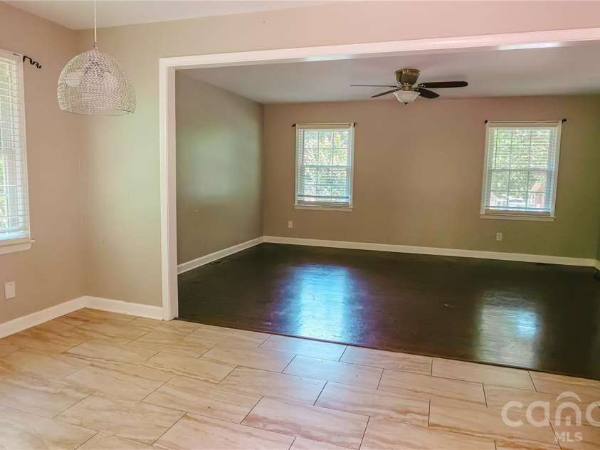 6315 Spring Garden Lane, Charlotte, NC 28213.  MLS# CAR4399820, YatesRealty ID 35177. Kitchen and Living Room