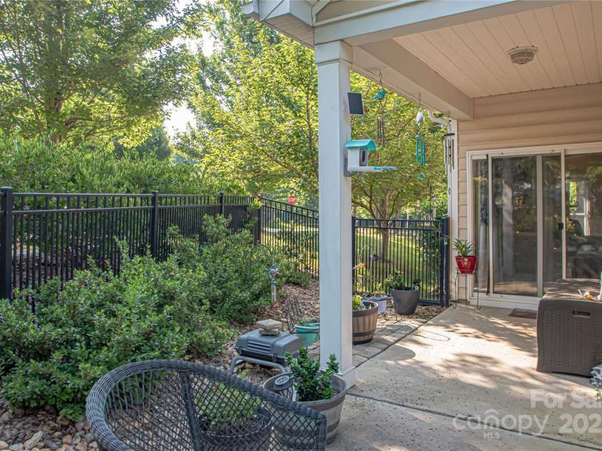 1304 Hammond Drive, Matthews, NC 28104.  MLS# CAR4289599, YatesRealty ID 35179. Backyard Porch