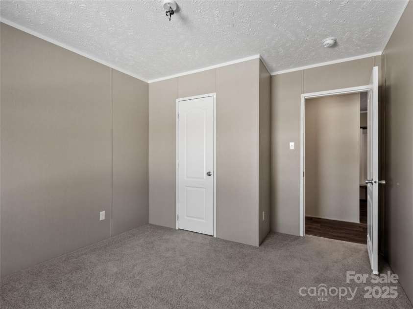 392 Burnsville School Road, Burnsville, NC 28714.  MLS# CAR4211732, YatesRealty ID 3518. 