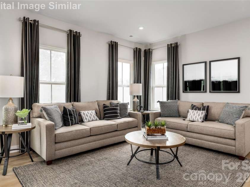 9568 Teamwork Street, Concord, NC 28027.  MLS# CAR4400105, YatesRealty ID 35180. In A Truly Open-Concept Home, The Living Room Becomes More Than Just A Place To Unwind - It's The Heart Of Connection, Creativity, And Comfort. With Walls Out Of The Way, Conversations And Energy Flow Freely From One Sp
