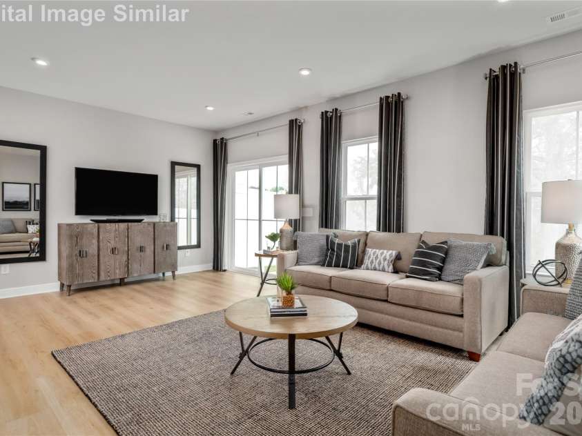 9568 Teamwork Street, Concord, NC 28027.  MLS# CAR4400105, YatesRealty ID 35180. Space That Breathes- The Lack Of Dividing Walls Creates A Sense Of Spaciousness That Feels Refreshing And Modern. Natural Light Spills In from Adjacent Areas, Making Everything Feel Bright And Welcoming.