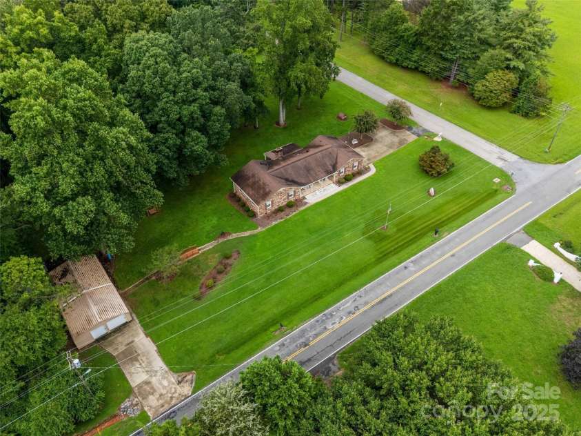 1945 Jim McCarter Road, Clover, SC 29710.  MLS# CAR4272277, YatesRealty ID 35184. Arial view of home and lot