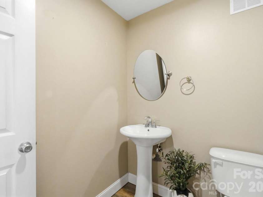107 Brendle Lane, Troutman, NC 28166.  MLS# CAR4398086, YatesRealty ID 35188. Finished basement half bath