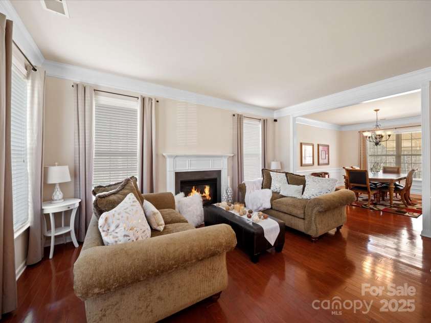 7719 Whisperingwood Drive, Harrisburg, NC 28075.  MLS# CAR4237557, YatesRealty ID 3519. Living Room