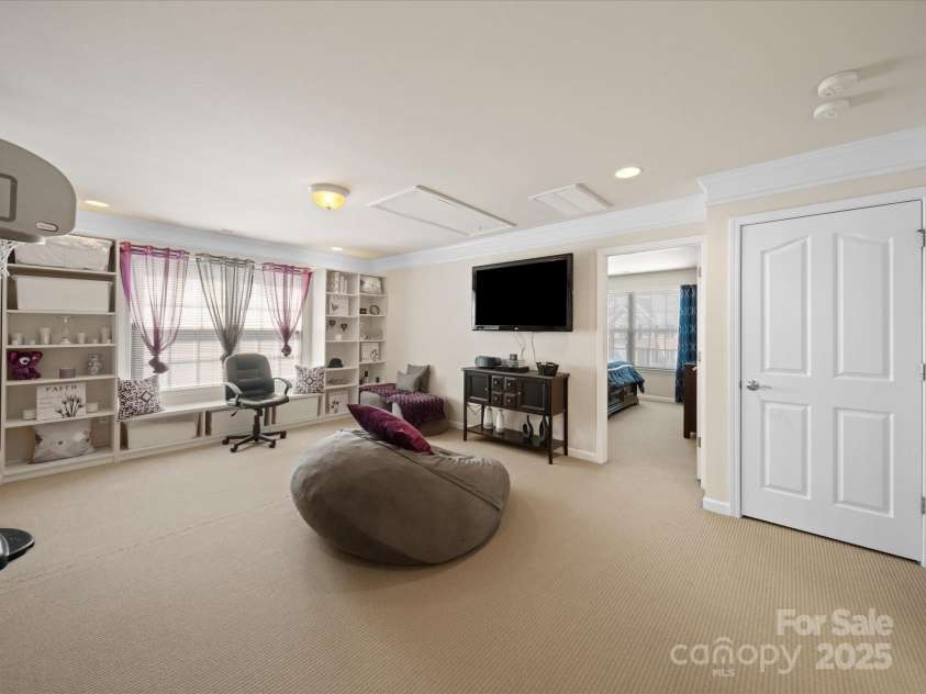 7719 Whisperingwood Drive, Harrisburg, NC 28075.  MLS# CAR4237557, YatesRealty ID 3519. Loft