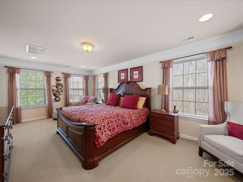 7719 Whisperingwood Drive, Harrisburg, NC 28075.  MLS# CAR4237557, YatesRealty ID 3519. Primary Bedroom