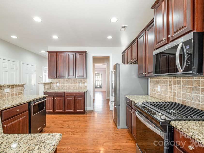 10142 Linksland Drive, Huntersville, NC 28078.  MLS# CAR4224492, YatesRealty ID 35193. 