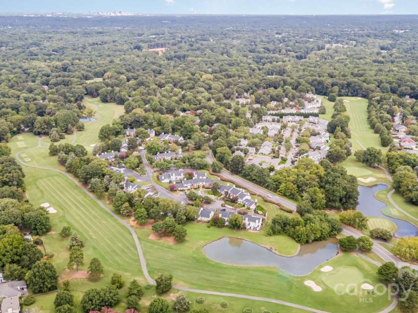 10929 Winterbourne Court, Charlotte, NC 28277.  MLS# CAR4296460, YatesRealty ID 35194. Aerial View of Raintree neighborhood looking towards Uptown