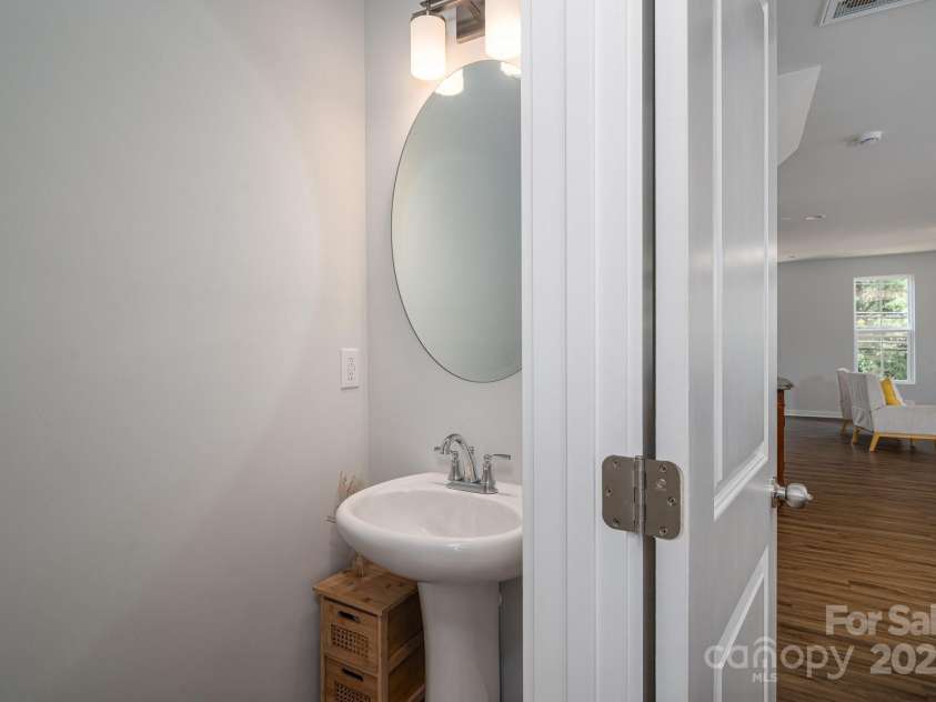 234 Gilead Road, Huntersville, NC 28078.  MLS# CAR4285483, YatesRealty ID 35199. Half bath off of living room