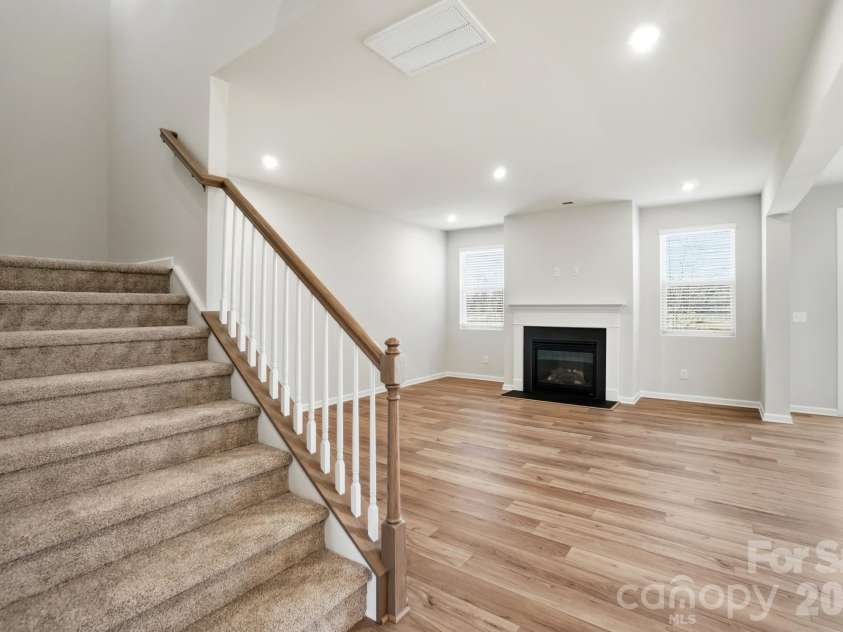 1340 Honey Trail, Monroe, NC 28112.  MLS# CAR4400781, YatesRealty ID 35200. Gathering room with fireplace