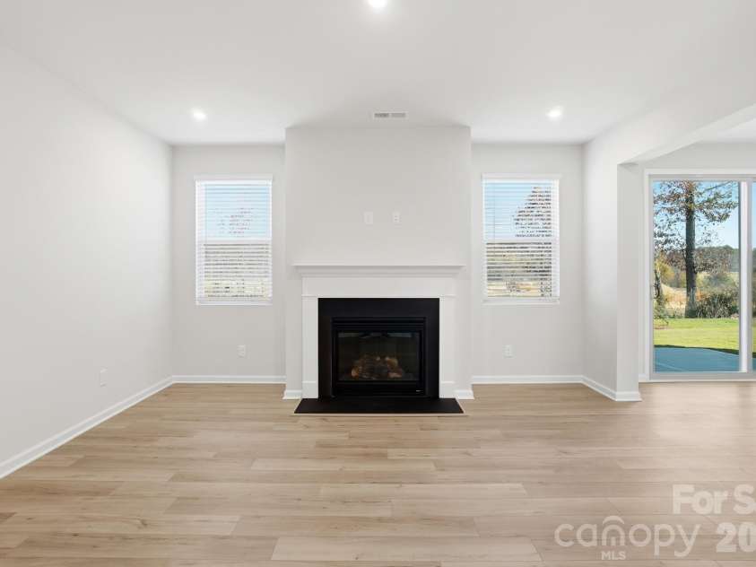 1340 Honey Trail, Monroe, NC 28112.  MLS# CAR4400781, YatesRealty ID 35200. Gathering room with fireplace