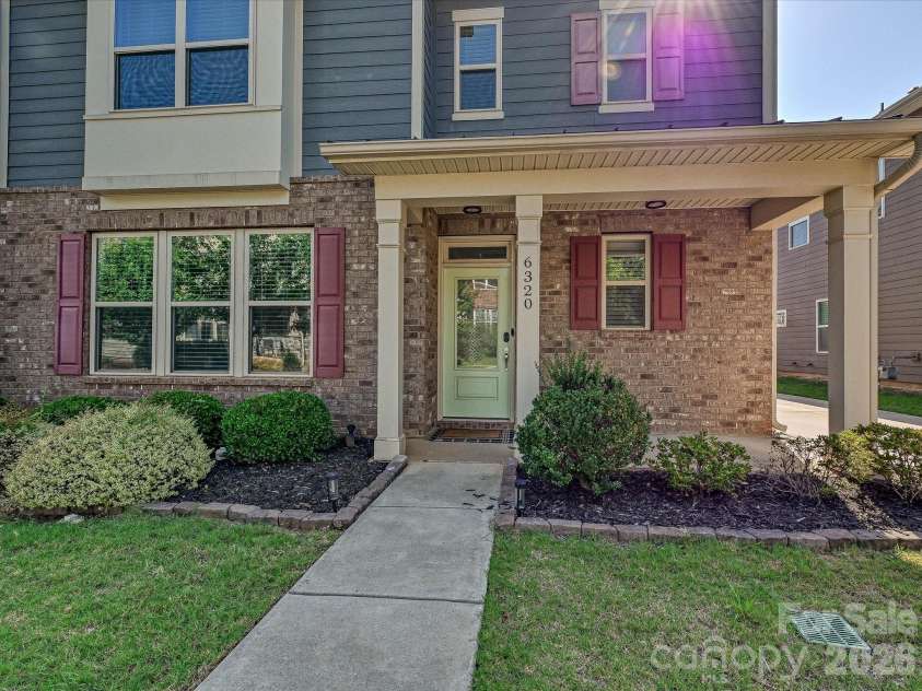 6320 Kennard Drive, Charlotte, NC 28216.  MLS# CAR4400358, YatesRealty ID 35206. Covered Front Porch
