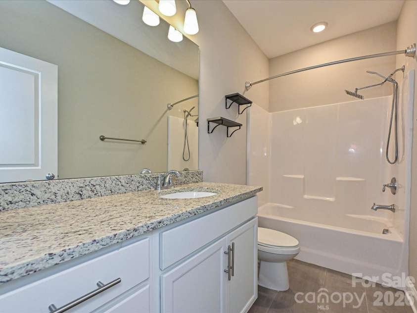 6320 Kennard Drive, Charlotte, NC 28216.  MLS# CAR4400358, YatesRealty ID 35206. Hall Bathroom