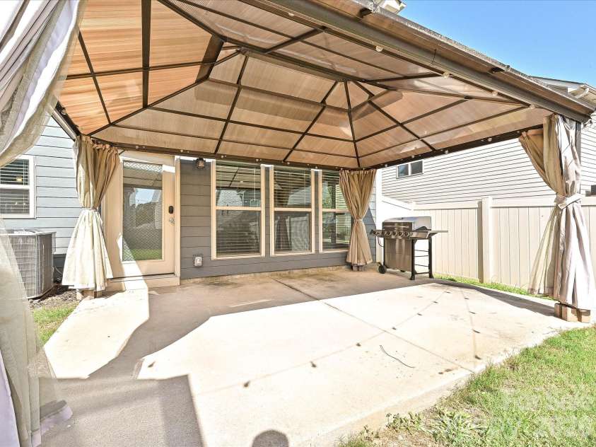 6320 Kennard Drive, Charlotte, NC 28216.  MLS# CAR4400358, YatesRealty ID 35206. Patio/ Pergola