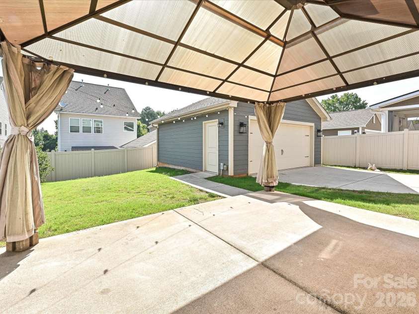 6320 Kennard Drive, Charlotte, NC 28216.  MLS# CAR4400358, YatesRealty ID 35206. Patio/ Pergola