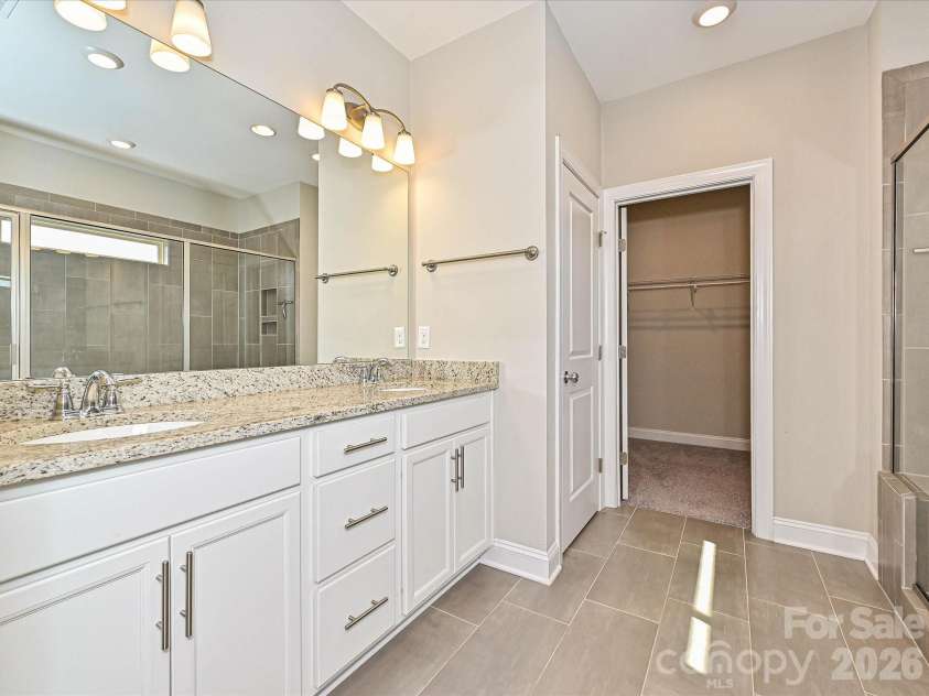 6320 Kennard Drive, Charlotte, NC 28216.  MLS# CAR4400358, YatesRealty ID 35206. Primary Bathroom