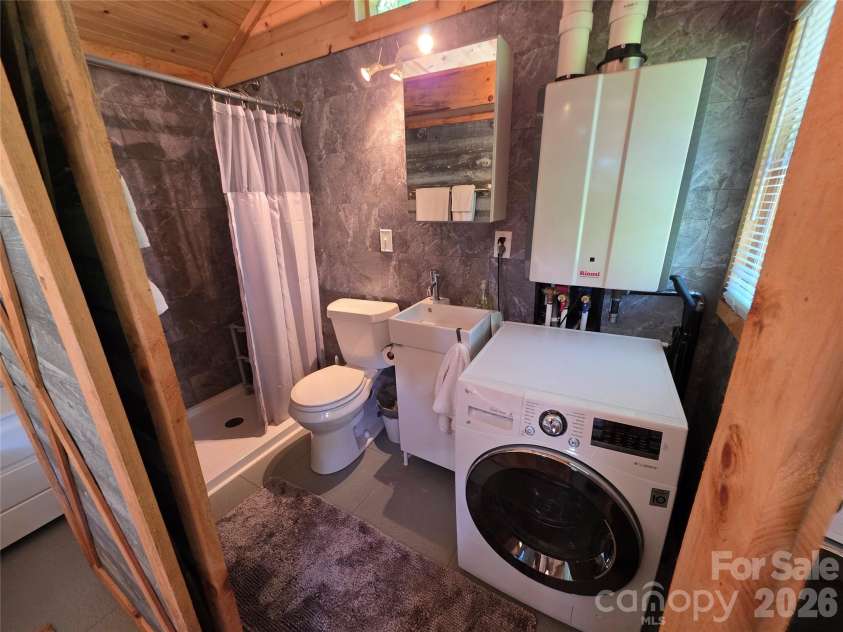 38 Lloyd Barnwell Road, Hendersonville, NC 28792.  MLS# CAR4394211, YatesRealty ID 35210. Ensuite tiny home bath.