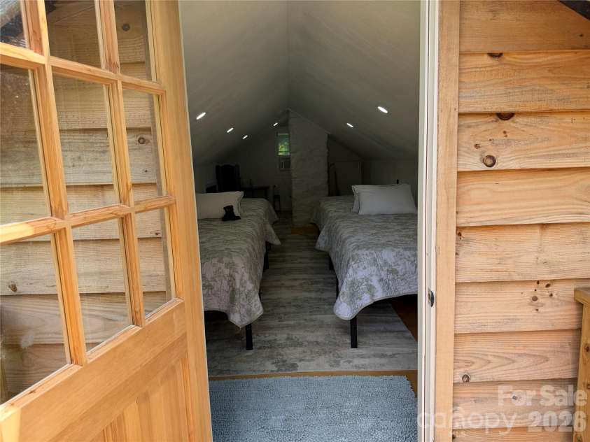 38 Lloyd Barnwell Road, Hendersonville, NC 28792.  MLS# CAR4394211, YatesRealty ID 35210. Entry view of the Sleeping Loft