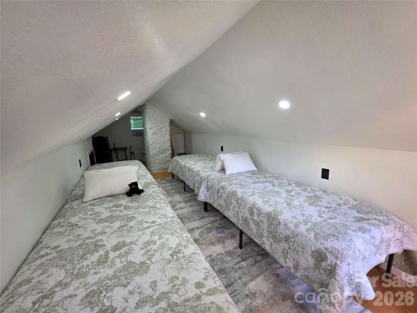 38 Lloyd Barnwell Road, Hendersonville, NC 28792.  MLS# CAR4394211, YatesRealty ID 35210. Sleepng loft
