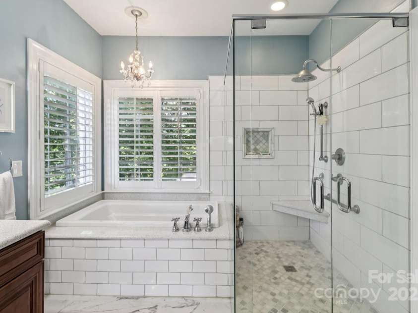 122 Ringneck Trail, Mooresville, NC 28117.  MLS# CAR4291490, YatesRealty ID 35216. Large zero entry shower and spa tub