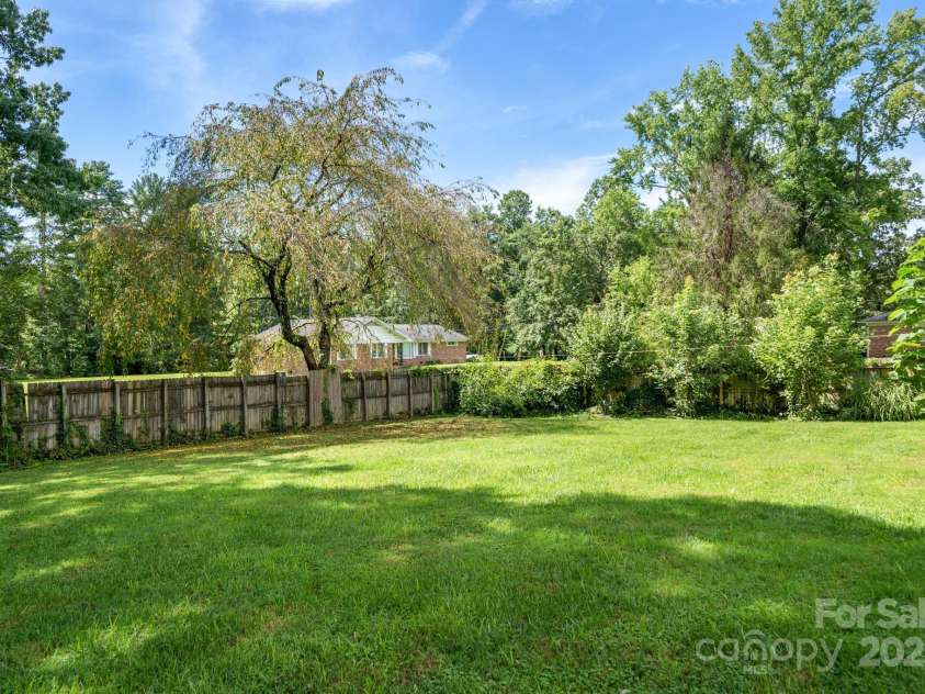 429 Brooklyn Avenue, Hendersonville, NC 28792.  MLS# CAR4289164, YatesRealty ID 35219. Fenced in Back Yard