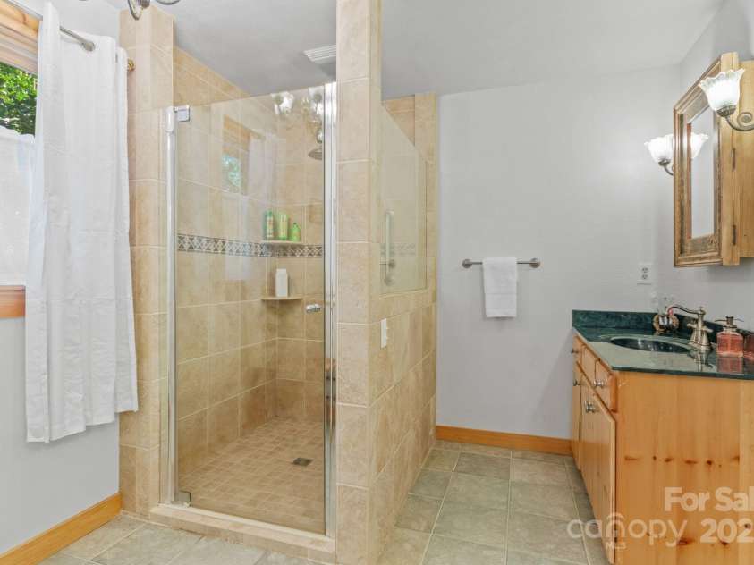230 Mallard Road, Lake Lure, NC 28746.  MLS# CAR4272686, YatesRealty ID 35223. Masterbathroom