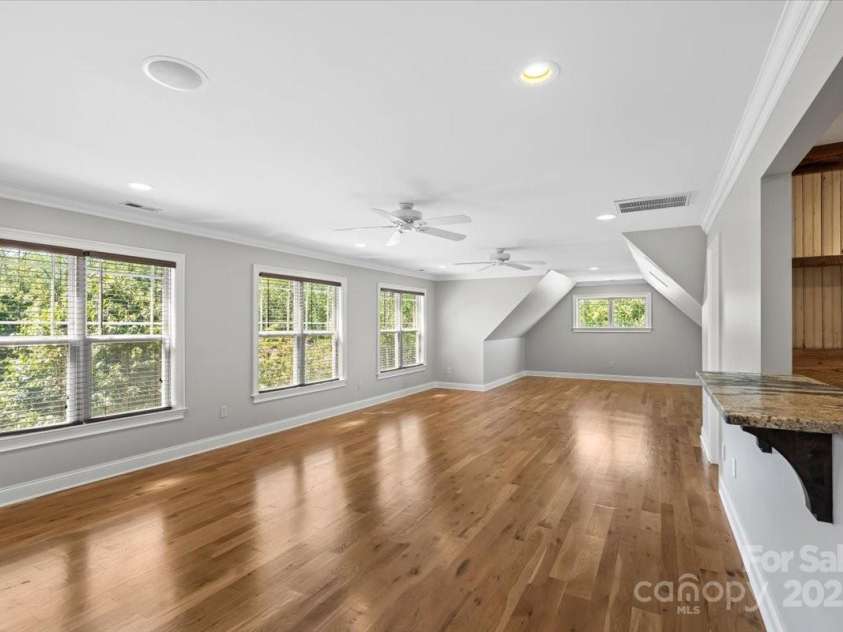 4038 Harmattan Drive, Denver, NC 28037.  MLS# CAR4297623, YatesRealty ID 35227. Look at the beautiful hardwood floors in here.. even the bonus/flex room!