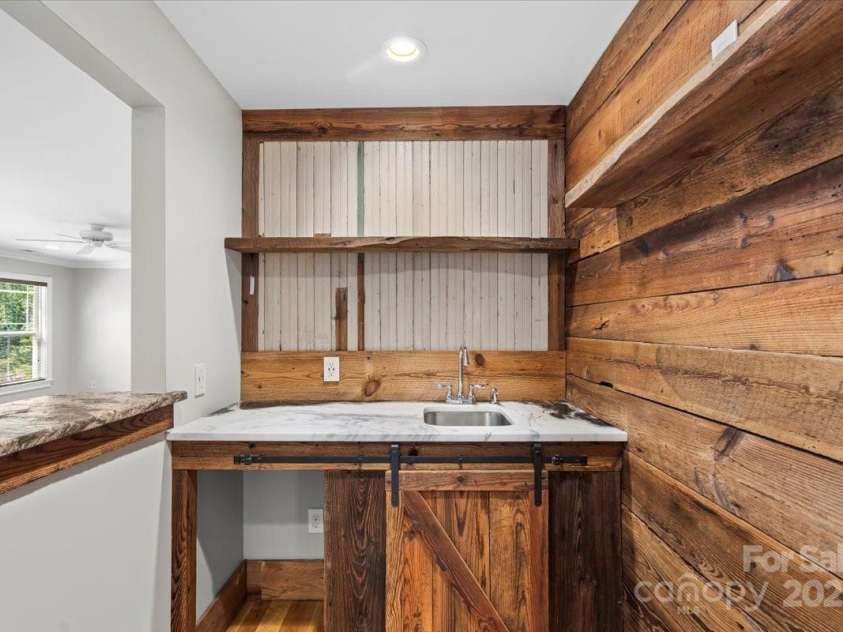 4038 Harmattan Drive, Denver, NC 28037.  MLS# CAR4297623, YatesRealty ID 35227. The Wet Bar in the flex room!