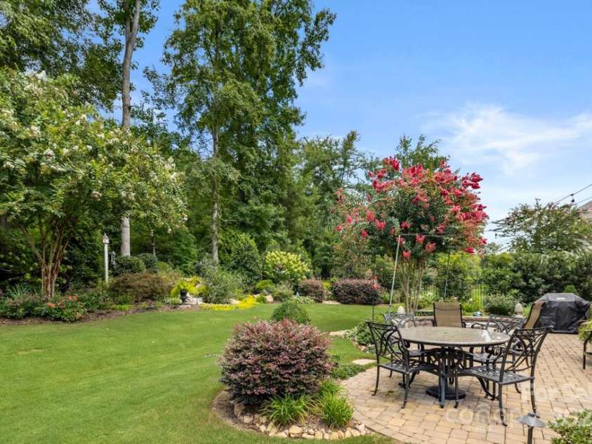 825 Spelman Drive, Indian Land, SC 29707.  MLS# CAR4289548, YatesRealty ID 35229. Fenced, Landscaped Backyard with Paver Patio