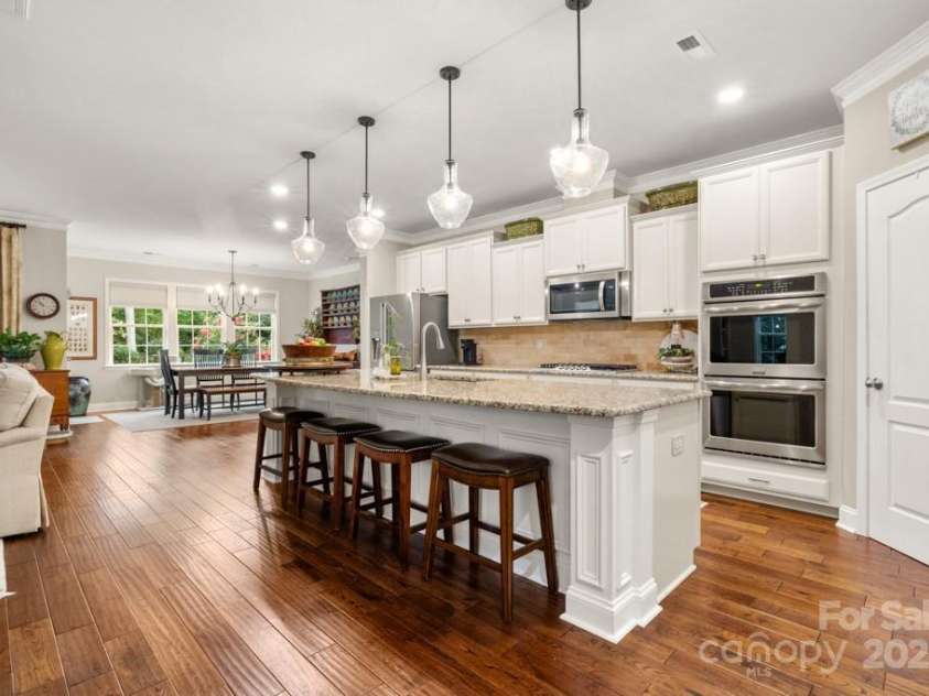 825 Spelman Drive, Indian Land, SC 29707.  MLS# CAR4289548, YatesRealty ID 35229. Open Kitchen w/ Island Bar