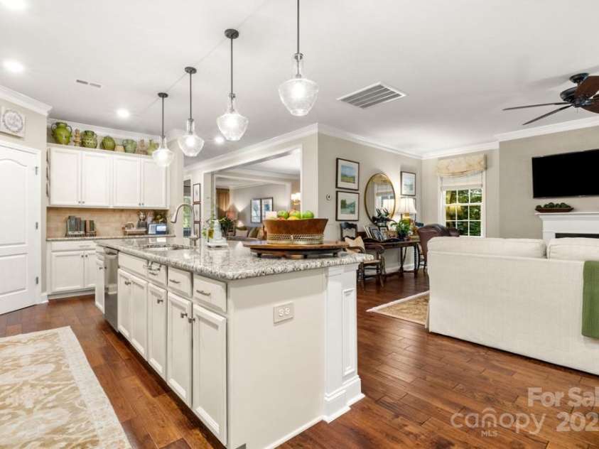 825 Spelman Drive, Indian Land, SC 29707.  MLS# CAR4289548, YatesRealty ID 35229. Open Kitchen w/ Island Bar Open to Great Room