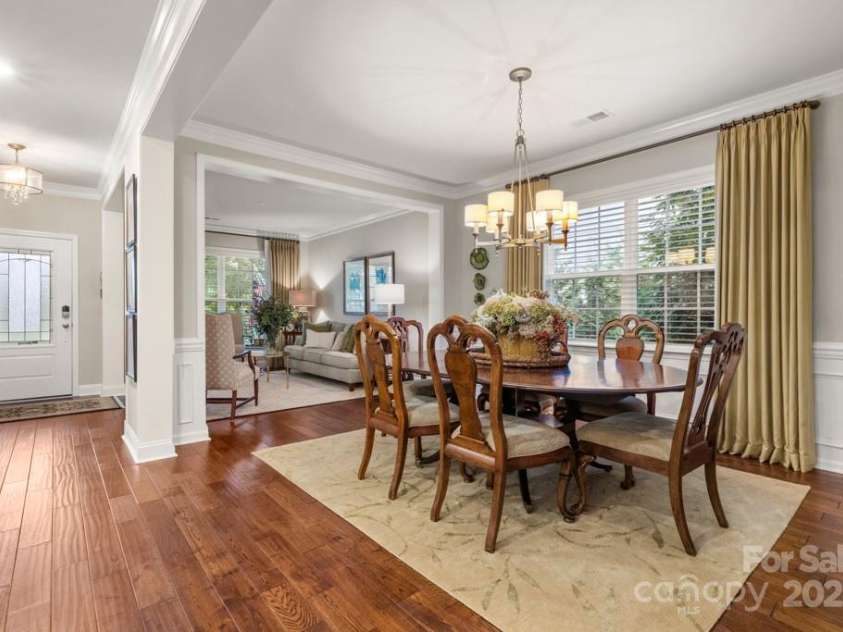 825 Spelman Drive, Indian Land, SC 29707.  MLS# CAR4289548, YatesRealty ID 35229. Open Living Room + Dining