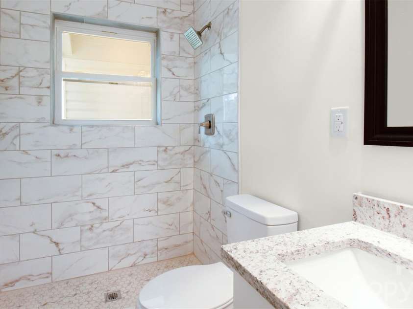 1325 Edgewater Drive, Charlotte, NC 28210.  MLS# CAR4316224, YatesRealty ID 3523. Side unit bathroom (stand up shower)