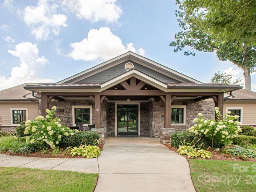1045 Princeton Drive, Indian Land, SC 29707.  MLS# CAR4286861, YatesRealty ID 35232. Community clubhouse with catering kitchen, main clubhouse gathering area, and library