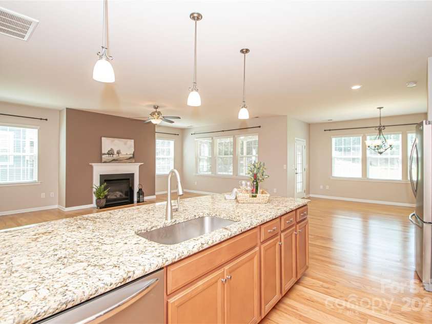 1045 Princeton Drive, Indian Land, SC 29707.  MLS# CAR4286861, YatesRealty ID 35232. Kitchen, family room, and in-kitchen dining