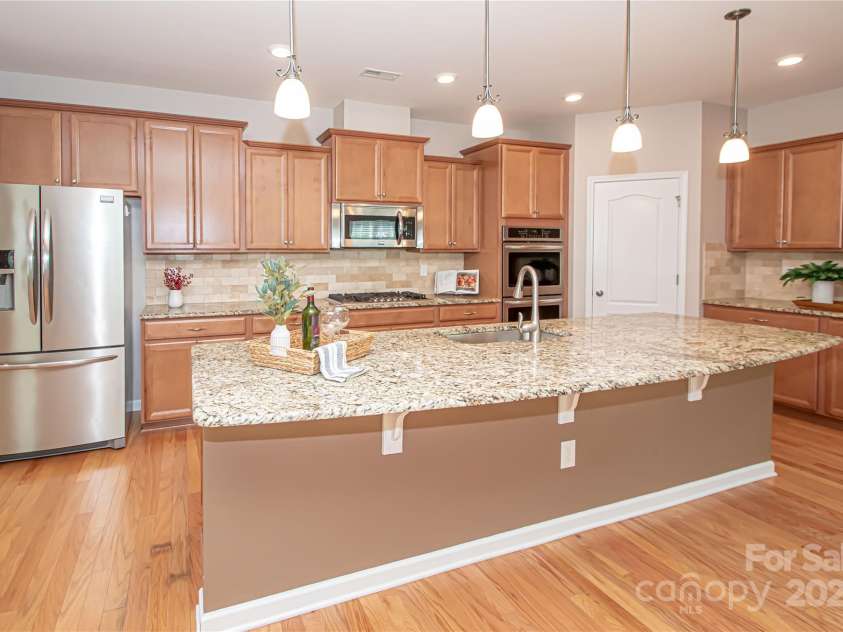 1045 Princeton Drive, Indian Land, SC 29707.  MLS# CAR4286861, YatesRealty ID 35232. Kitchen with large island