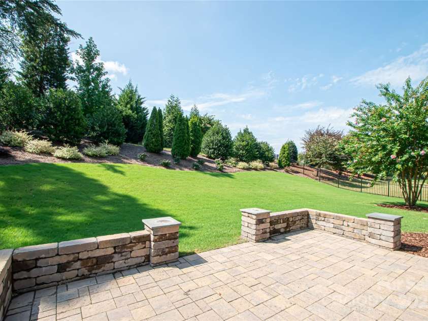 1045 Princeton Drive, Indian Land, SC 29707.  MLS# CAR4286861, YatesRealty ID 35232. Patio with beautifully landscaped and fenced back yard
