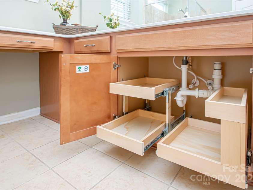 1045 Princeton Drive, Indian Land, SC 29707.  MLS# CAR4286861, YatesRealty ID 35232. Primary bath - pull-out shelves for easy storage