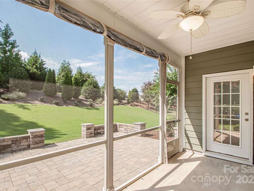 1045 Princeton Drive, Indian Land, SC 29707.  MLS# CAR4286861, YatesRealty ID 35232. Screened porch with seasonal coverings