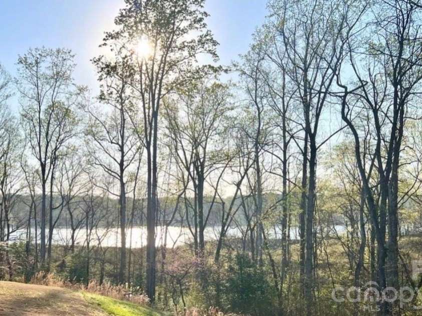 4518 Duplin Drive, Charlotte, NC 28214.  MLS# CAR4386014, YatesRealty ID 35236. Partial Lake View in the Spring