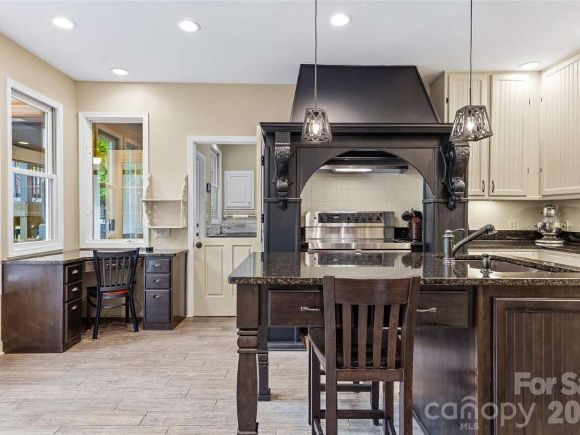61 Scroops Drive, Swannanoa, NC 28778.  MLS# CAR4393585, YatesRealty ID 35237. Desk in the kitchen.