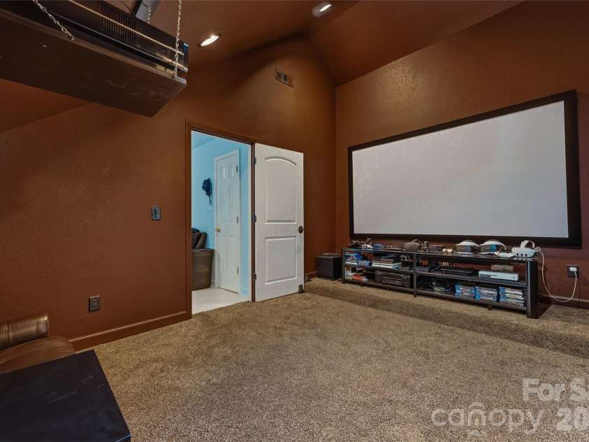 61 Scroops Drive, Swannanoa, NC 28778.  MLS# CAR4393585, YatesRealty ID 35237. Movie/game room