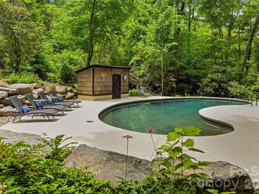 61 Scroops Drive, Swannanoa, NC 28778.  MLS# CAR4393585, YatesRealty ID 35237. Pool mechanical building keeps everything protected and tidy.
