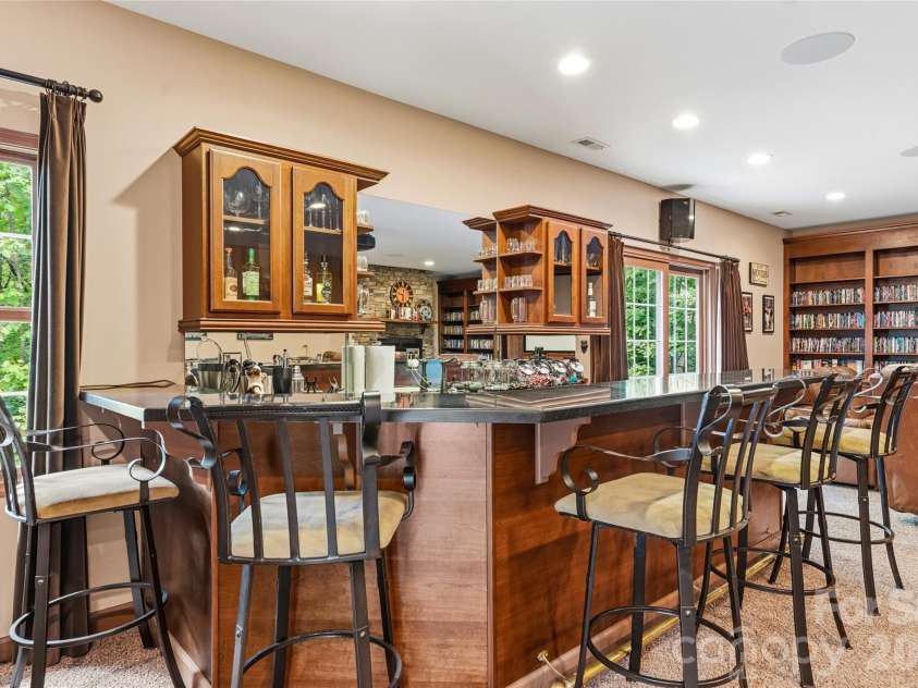 61 Scroops Drive, Swannanoa, NC 28778.  MLS# CAR4393585, YatesRealty ID 35237. Wet bar with wine refrigerator and drink refrigerator.