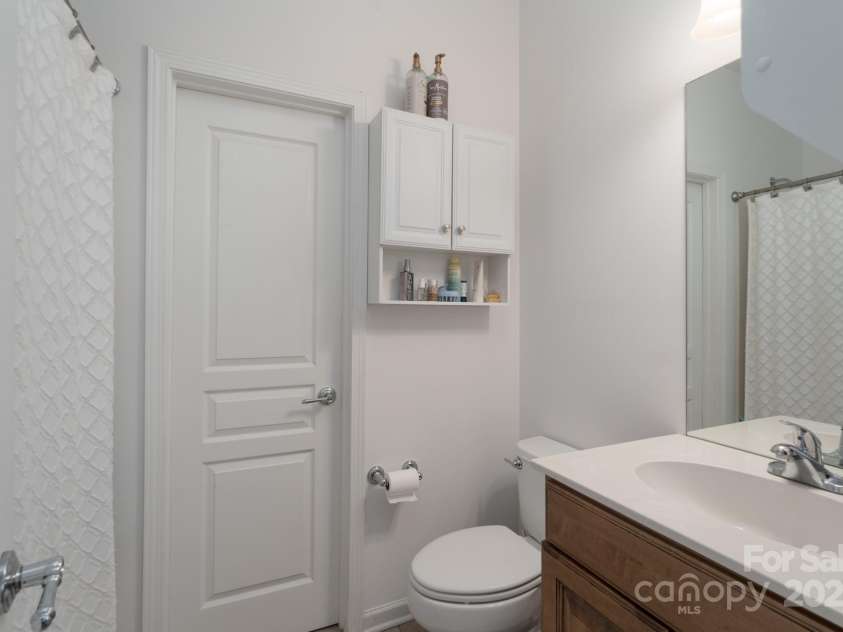 10005 Chimney Drive, Waxhaw, NC 28173.  MLS# CAR4235239, YatesRealty ID 3524. Bathroom connected to Upper Level Bedroom