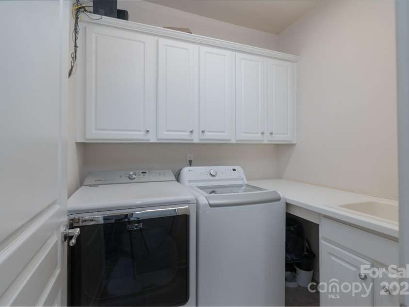 10005 Chimney Drive, Waxhaw, NC 28173.  MLS# CAR4235239, YatesRealty ID 3524. Upper Level Laundry Room