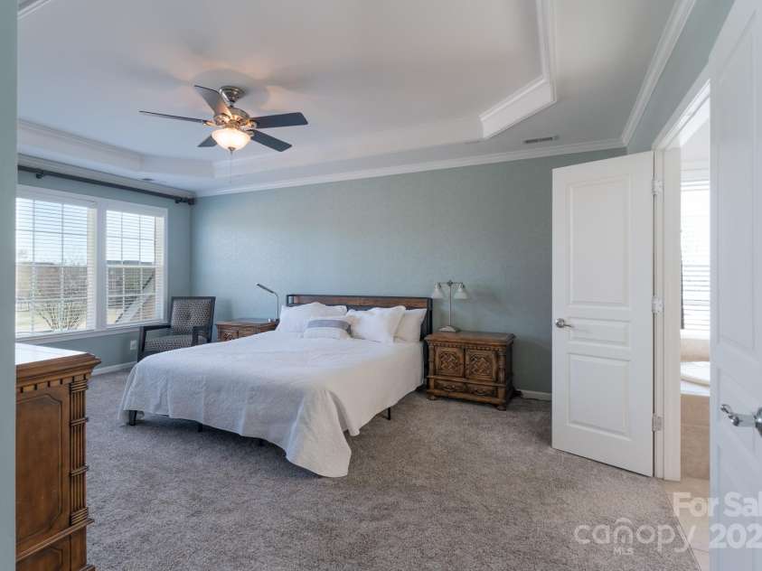 10005 Chimney Drive, Waxhaw, NC 28173.  MLS# CAR4235239, YatesRealty ID 3524. Upper Level Primary Bedroom