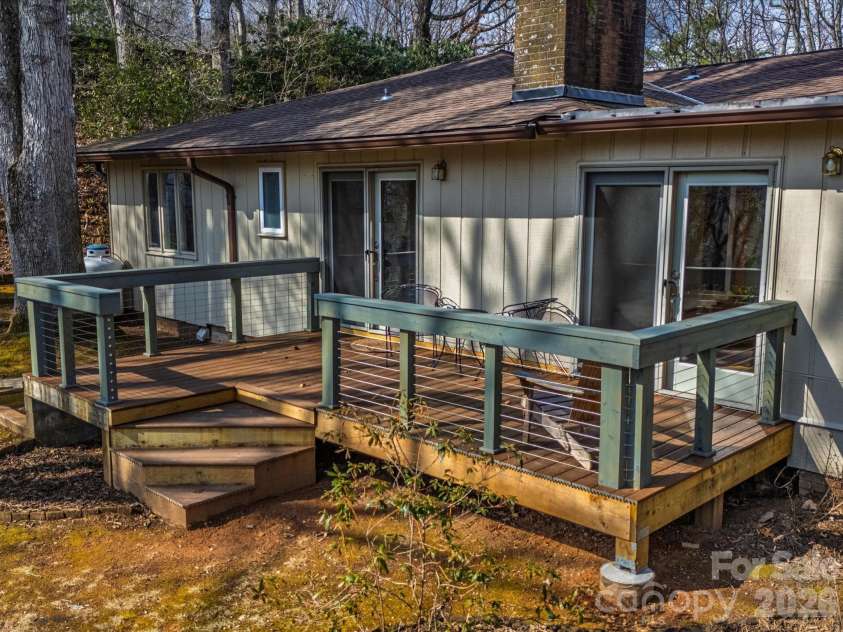 200 Canterbury Road, Cullowhee, NC 28723.  MLS# CAR4350143, YatesRealty ID 3524. Deck rebuilt in 2025 with Trex decking!